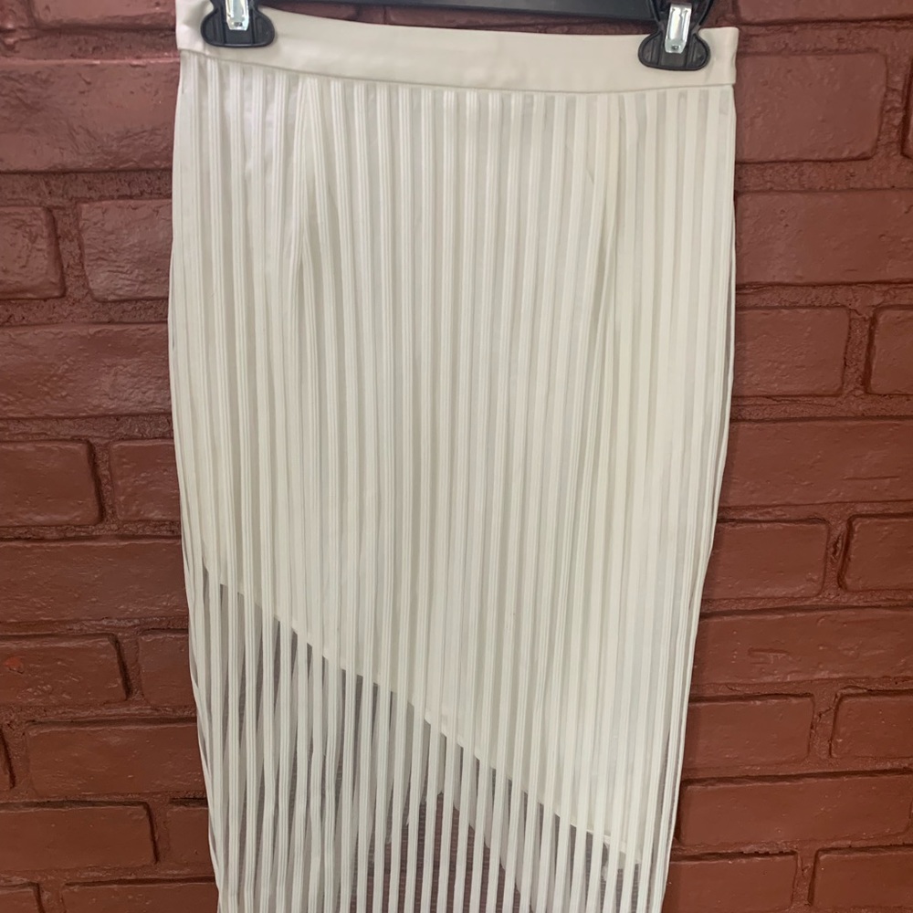 Asymmetrical midi skirt with “leather” waist